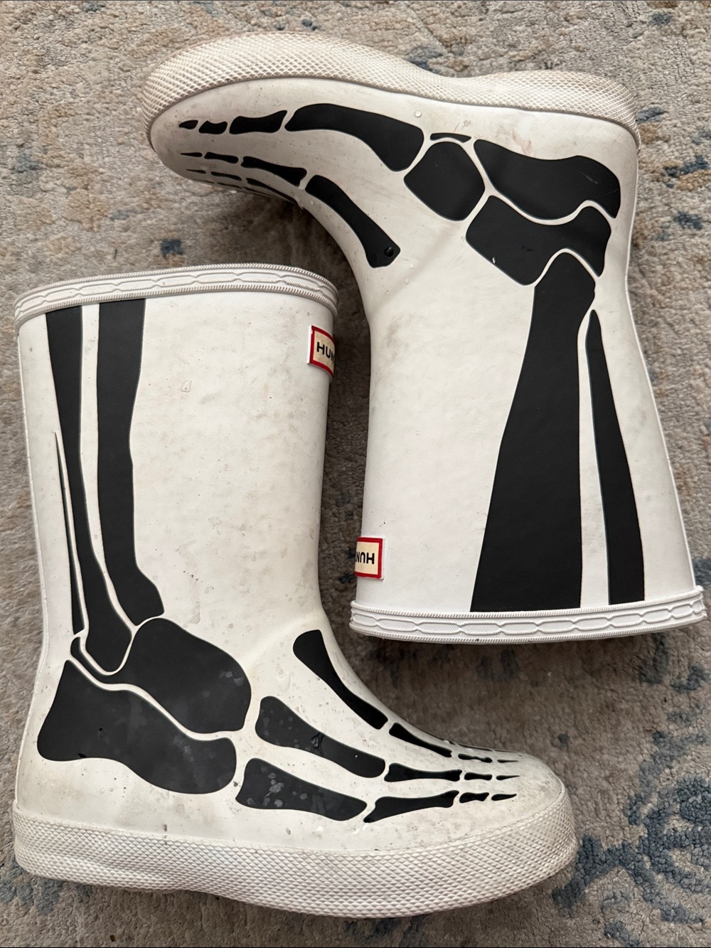 Hunter Kids White Rain Boots with Black Skeleton Print